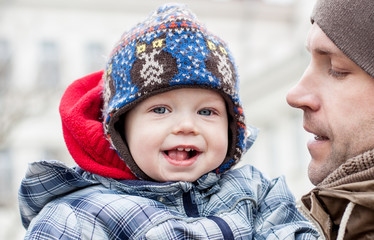 happy baby with his father