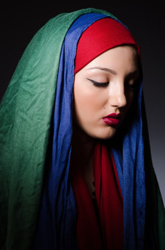 Portrait of the young woman with headscarf