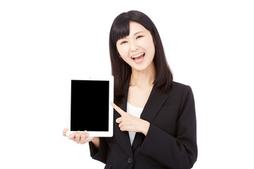 Fototapeta premium タブレットを持って案内するビジネスウーマン