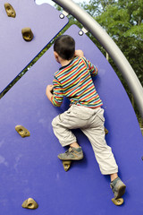 Child climbing at playground
