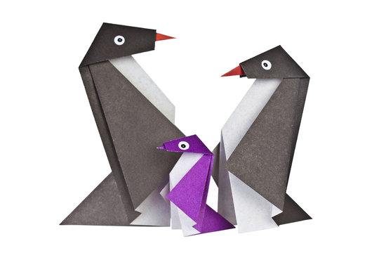 Origami. Paper figures of penguins