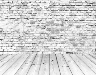 Old brick wall on wood floor