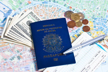 Brazilian passport, money and ticket