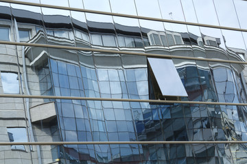 Fototapeta na wymiar Reflex in building windows