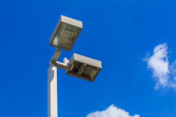 streetlight with blue sky.