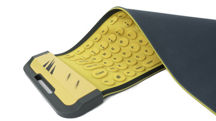 Flexible rubber computer keyboard isolated on white background