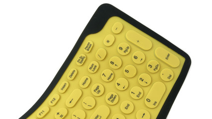 Flexible rubber computer keyboard isolated on white background