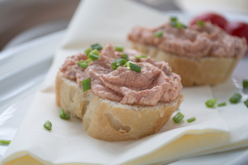 Fresh tomato spread on a bread slice