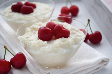 Milk rice with fresh cherries