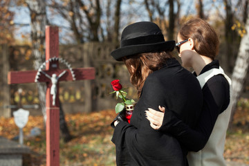 Women on the cemetery