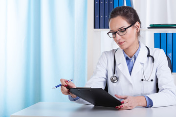 Doctor in her office