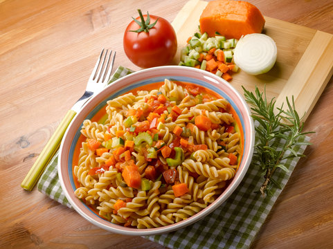 fusilli with zucchinis carrots and fresh tomatoes