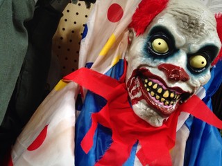 Scary Halloween clown on sale at store.