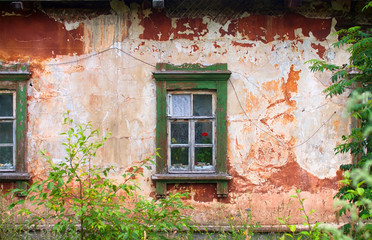 Fototapeta na wymiar Old ditrty wooden window on old house