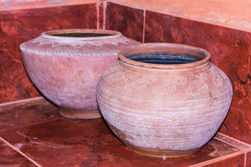 Clay pot on drinking water is the Thai way of life , lanna style