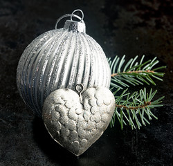 Patterned silver Christmas bauble and heart