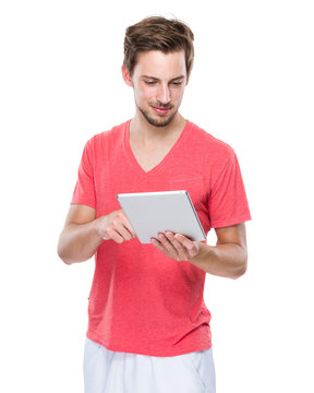 Handsome man use of digital tablet