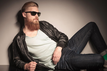 Cool guy resting on studio floor