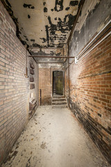 fish eye shoot of an old ruinous corridor