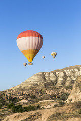 Fototapeta na wymiar Hot air balloon flying over Cappadocia