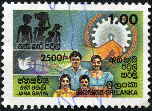stamp printed in the Ceylon shows image of a family members