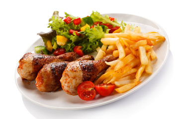 Grilled chicken legs with vegetables