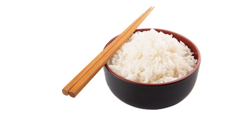 A bowl of rice and a pair of chopstick over white background