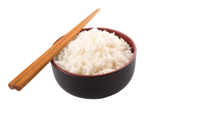 A bowl of rice and a pair of chopstick over white background