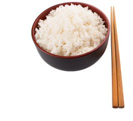 A bowl of rice and a pair of chopstick over white background