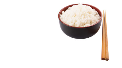 A bowl of rice and a pair of chopstick over white background