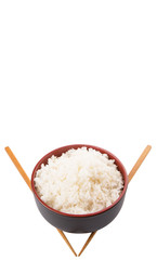 A bowl of rice and a pair of chopstick over white background