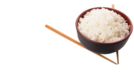A bowl of rice and a pair of chopstick over white background