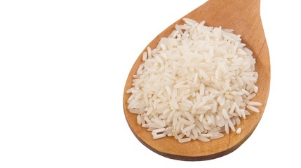 Raw and uncooked rice in wooden spoon over white background