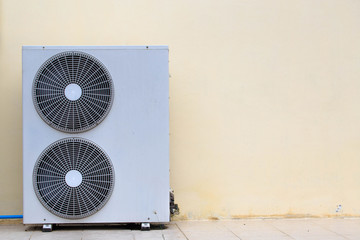 Close up air conditioner heating units installation outside of b
