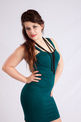 woman in green dress and black beads