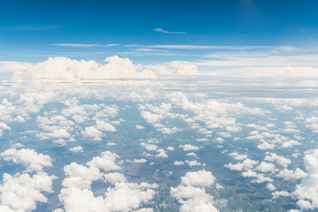 Fototapeta na wymiar Airplane trace over the clouds