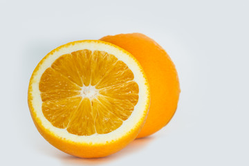 Orange fruit sliced ​​in half