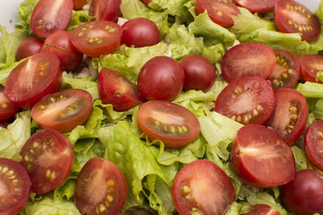 Tomatoes on lettuce leaves