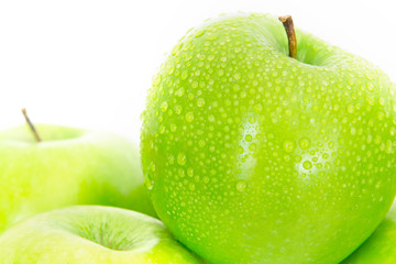 Close up fresh green apple with droplet