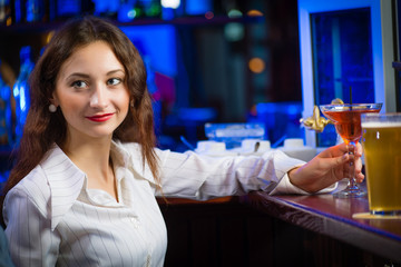 young woman in a bar