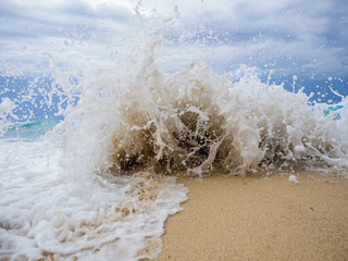 waves breaking on a stony beach