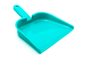 Green dustpan isolated on white background