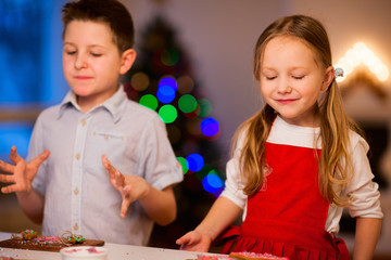 Kids baking Christmas cookies