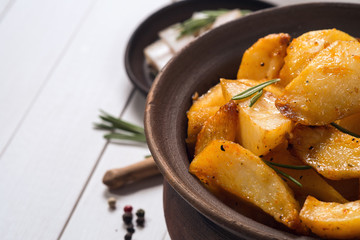 Baked potatoes in a clay pot