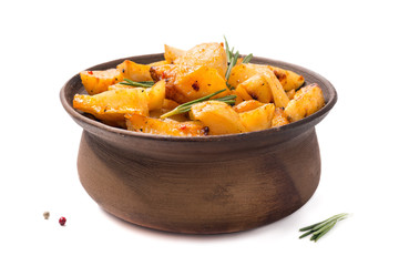 Baked potatoes in a clay pot on a white background