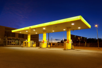 Empty gas station with blue night sky in Finland