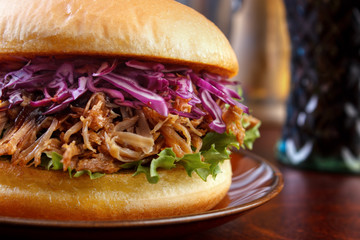 Pulled pork burger with red cabbage salad closeup - 69856455