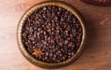 roasted coffee beans in a bamboo basket