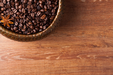 roasted coffee beans in a bamboo basket