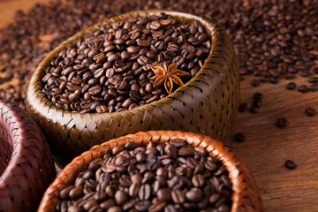 roasted coffee beans in a bamboo basket